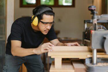 Man using a planer