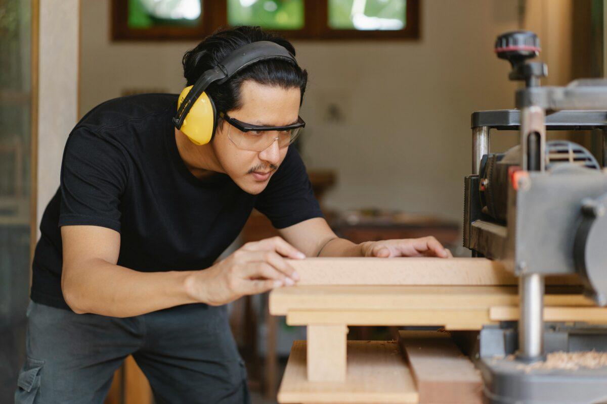 Man using a planer